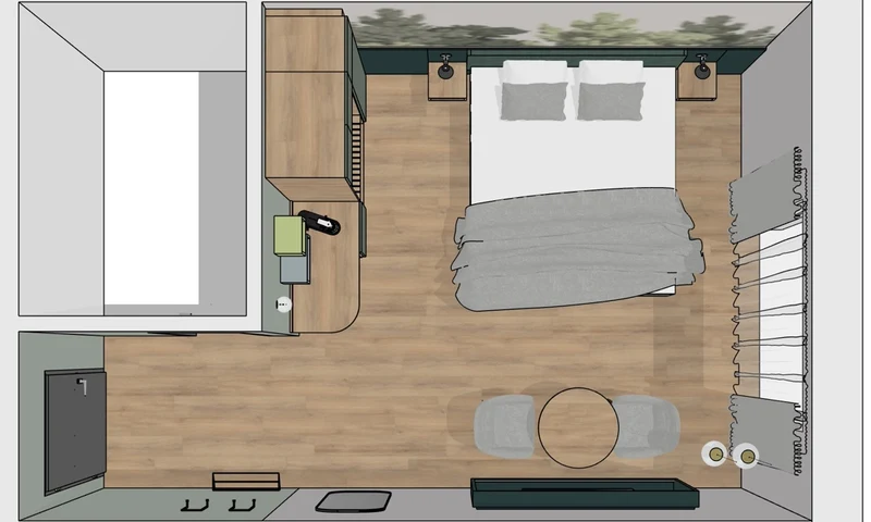 Grundriss eines Gästezimmers mit Doppelbett, Schreibtisch und Sitzbereich